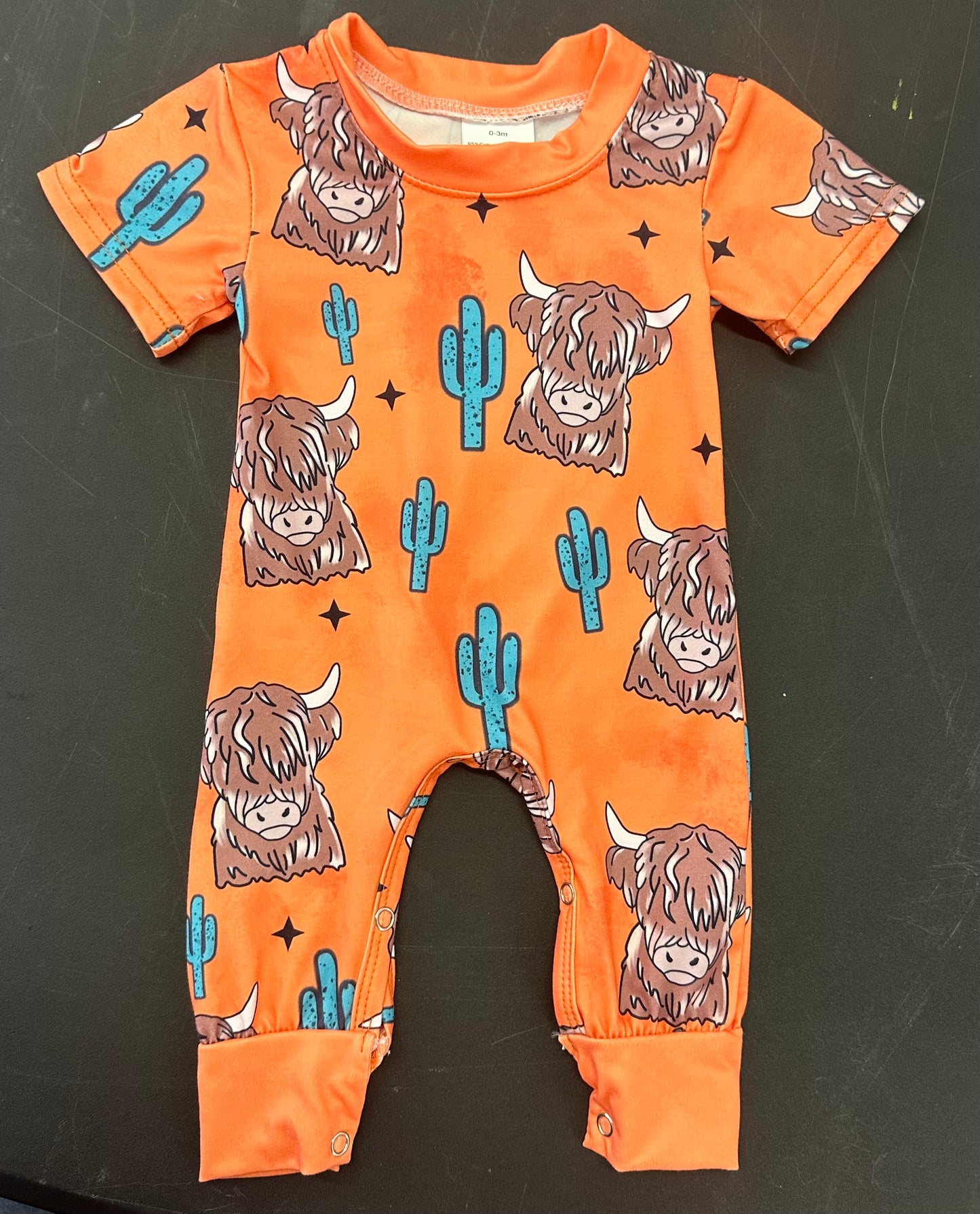 Orange highland romper